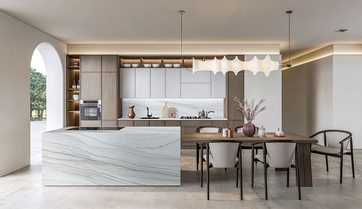 Modern kitchen with a waterfall island in White Macaubas quartzite